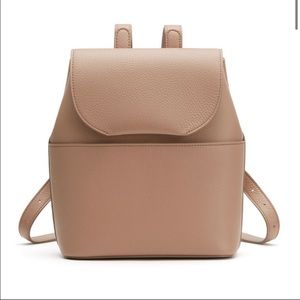 Cuyana Mini Leather Backpack in Cappuccino Pebbled Leather.